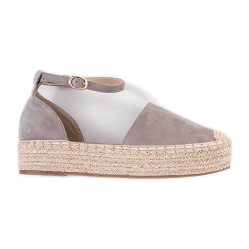 Grå espadriller på sommarplattformen beige