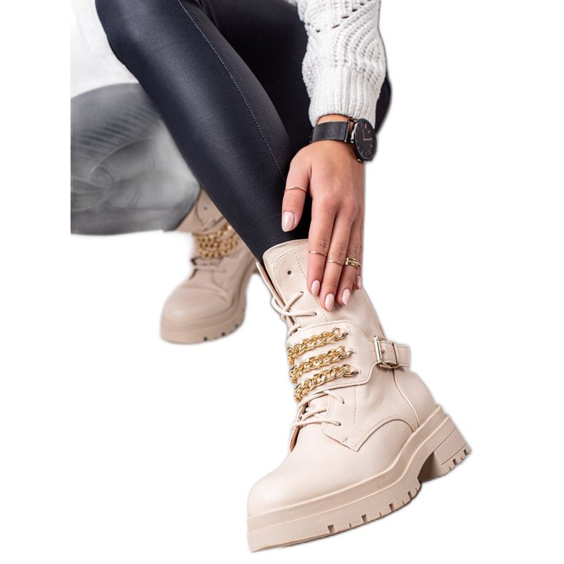 Seastar Arbetare Med En Kedja beige