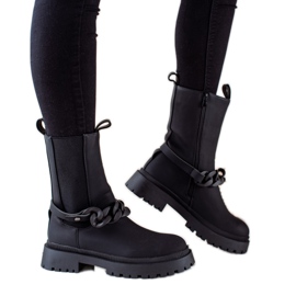 TRENDI Svarta arbetare med ett dekorativt bälte