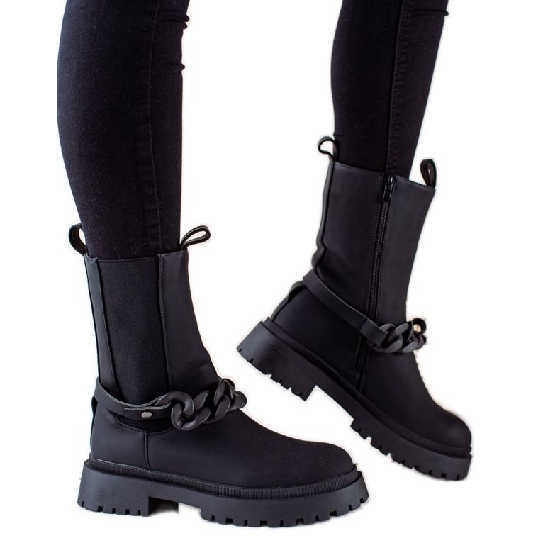 TRENDI Svarta arbetare med ett dekorativt bälte