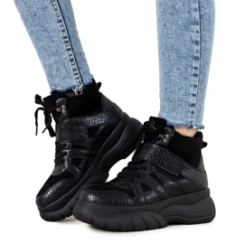 Svarta vinterskor med tema Ninette animal