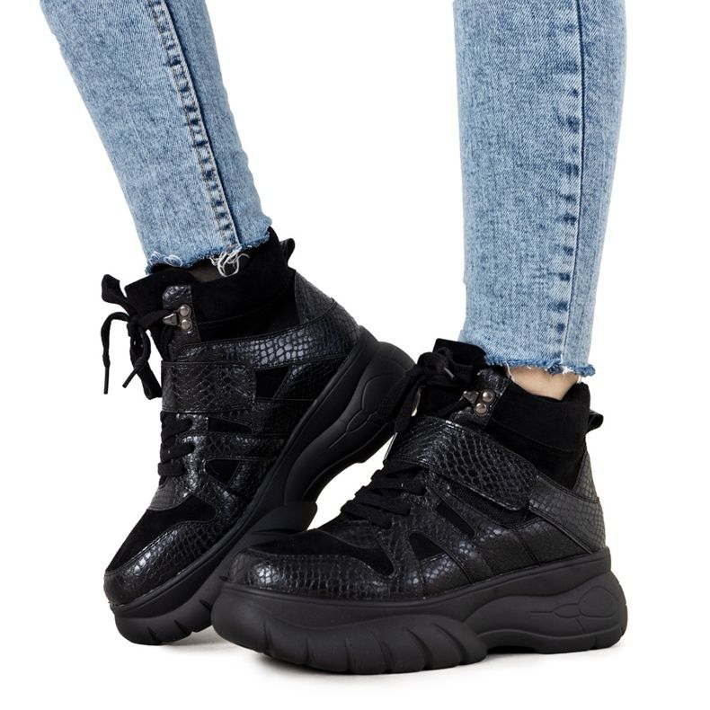 Svarta vinterskor med tema Ninette animal