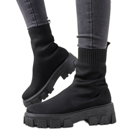 Svarta stövlar på en tjock sula Randy