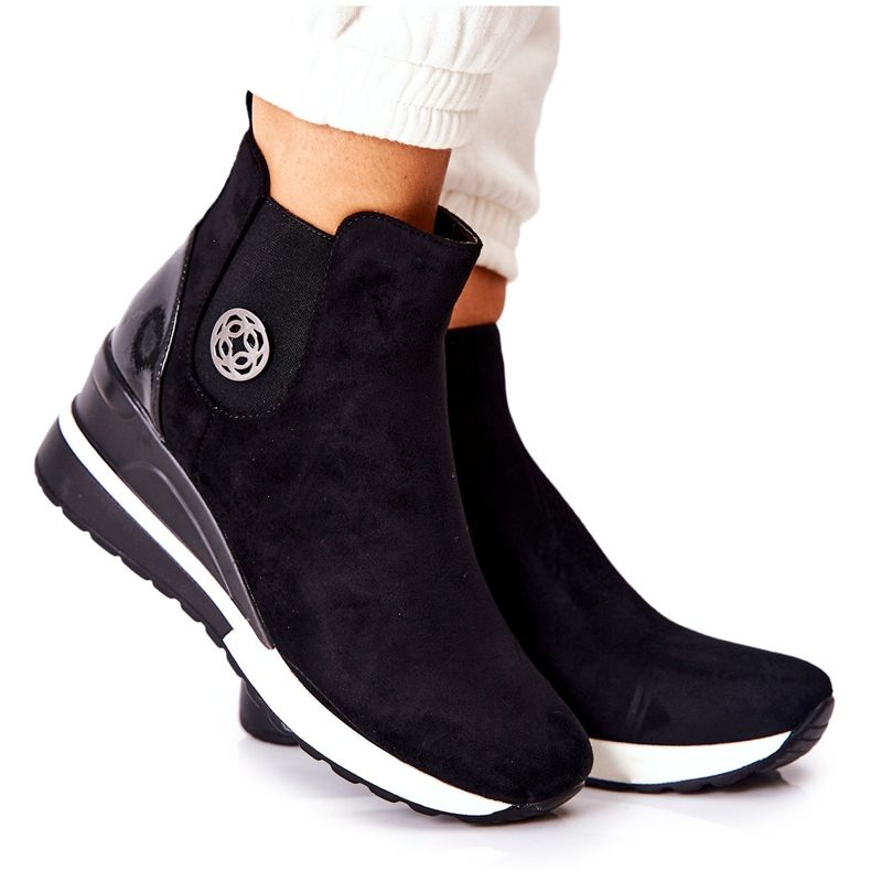 POTOCKI Svarta stövlar i mocka på Wedge Lunelle