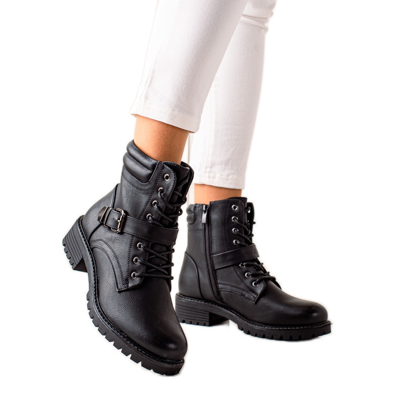 Anesia Paris Svarta arbetare med ett spänne