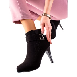 Camo Svarta stövlar på en hög klack