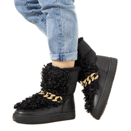 Svarta snöstövlar med päls från Montmina