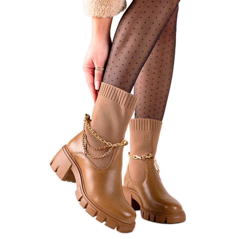 Seastar Snygga arbetare med en strumpa brun