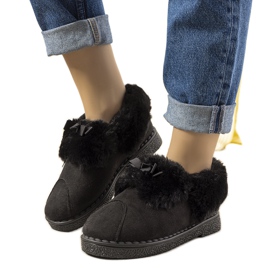 Svarta tofflor med pälsisolerad Valle