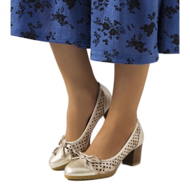 Pereira guld genombrutna pumps gyllene