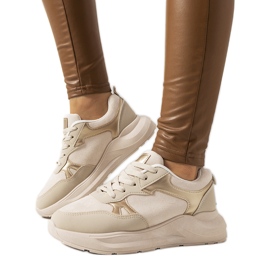 Beige sneakers med gyllene Davis-accenter