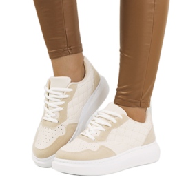 Beige sneakers på Gasperi-plattformen