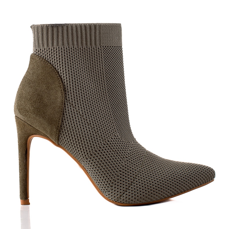 Matchande stövlar på en S. Barski-klack grön