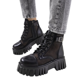 Svarta stövlar med genombruten Potts ovandel