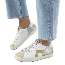 Amaal glänsande vita sneakers beige