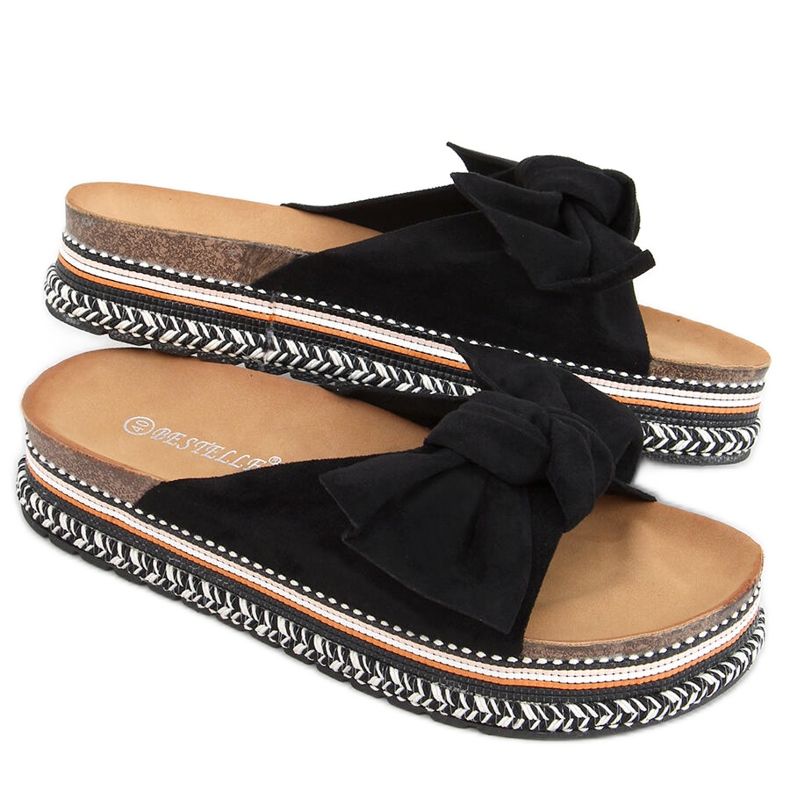 Flip-flops på en dekorerad Lane Black sula svart