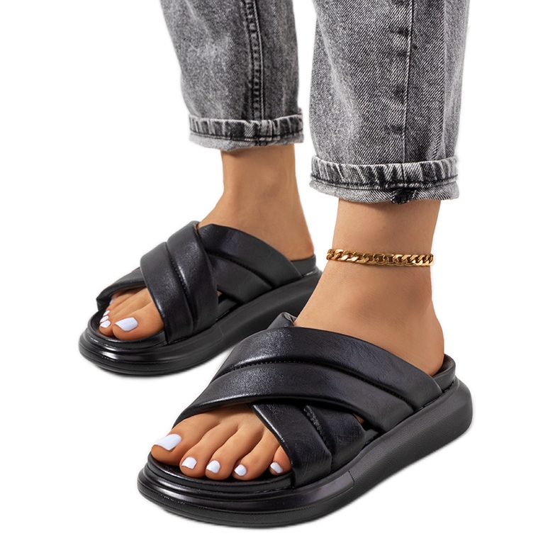 Svarta tofflor på Allport-plattformen