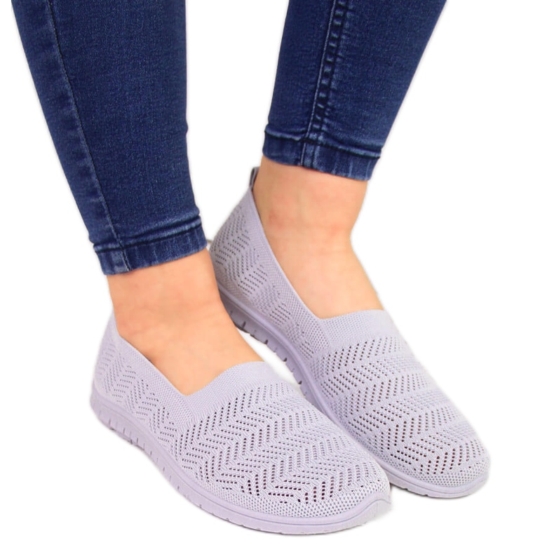 Genombrutna sneakers för kvinnor glider på grå Filippo