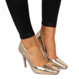 Pumps på guld Seastar-klack gyllene