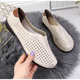 Damskor i beige genombrutna läder Rieker 48457