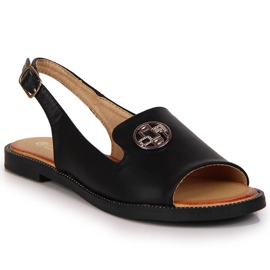 Damsandaler med en svart Filippo-prydnad