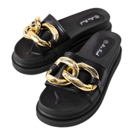 Svarta tofflor på Berloz-plattformen