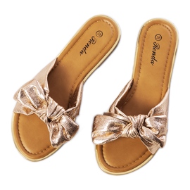 Gyllene tofflor med Yoho-rosett rosa