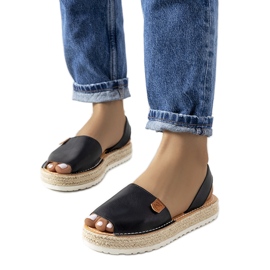 Svarta espadrillor på Verdams plattform