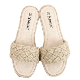 Erika Beige stringtofflor för kvinnor