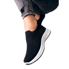 Shelovet svarta sneakers för kvinnor med vit sula