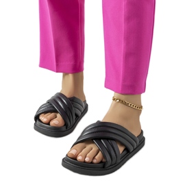 Svarta tofflor på Daintree-plattformen