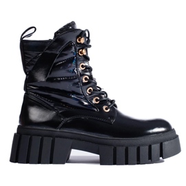 Svarta kvinnors arbetarskor med tjock sula