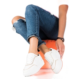 Vita Shelovet damsneakers med guldfoder gyllene