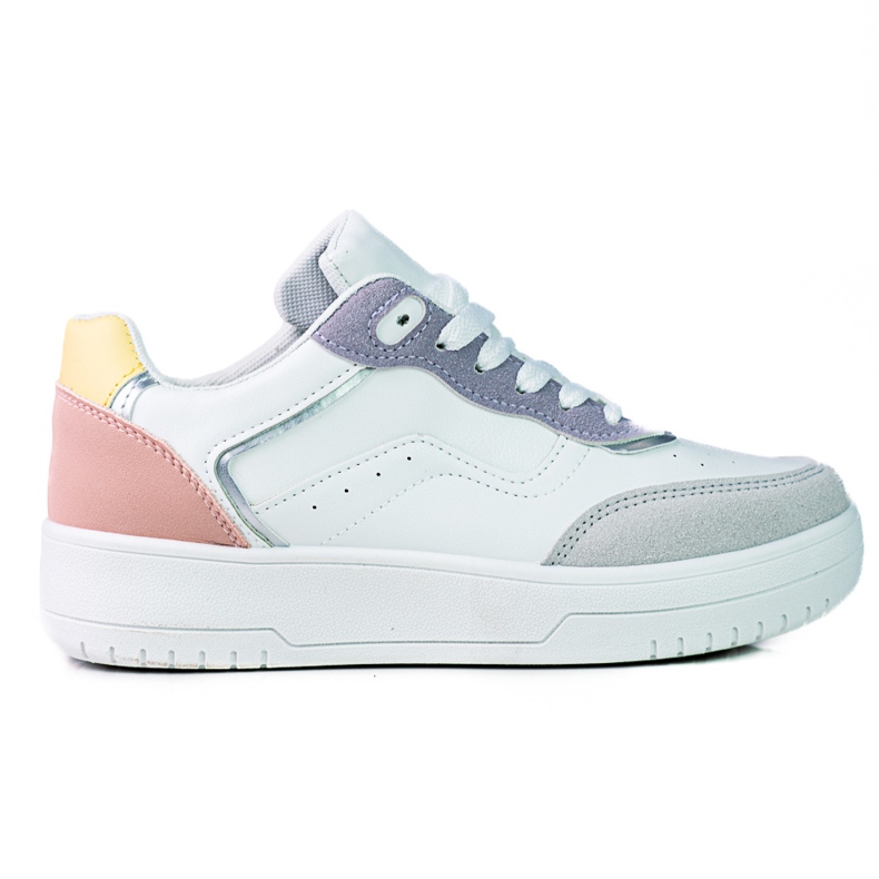 Shelovet kvinnors sportskor på en vit plattform