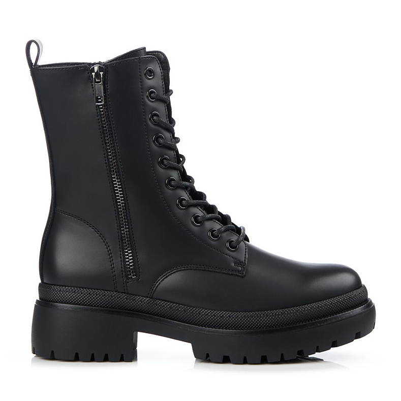 Kvinnliga arbetare med en dekorativ Shelovet-dragkedja svart