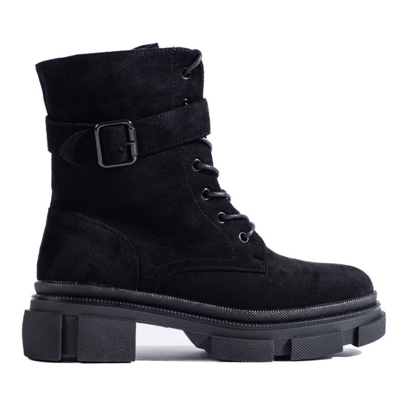 Svarta damväskor på en tjock Shelovet-sula