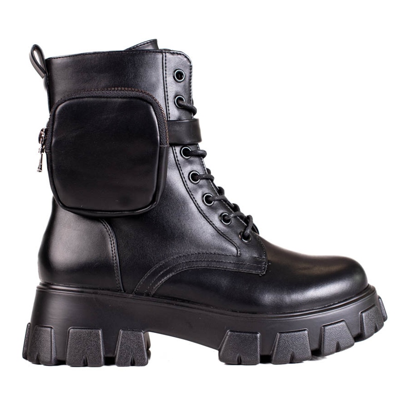 Svarta kvinnors spetsarbetare med en väska