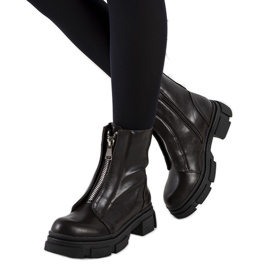 Bruna stövlar med en dekorativ Neal-dragkedja