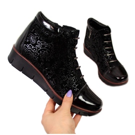 Skinnisolerade stövlar för kvinnor med svart Filippo-tryck