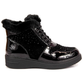 Svarta Rieker 93312-00 läderisolerade läderstövlar på plattformen