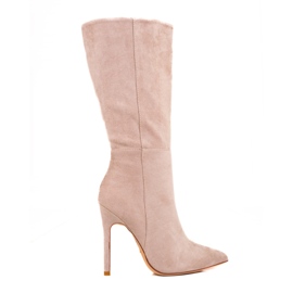Beige högklackade damstövlar