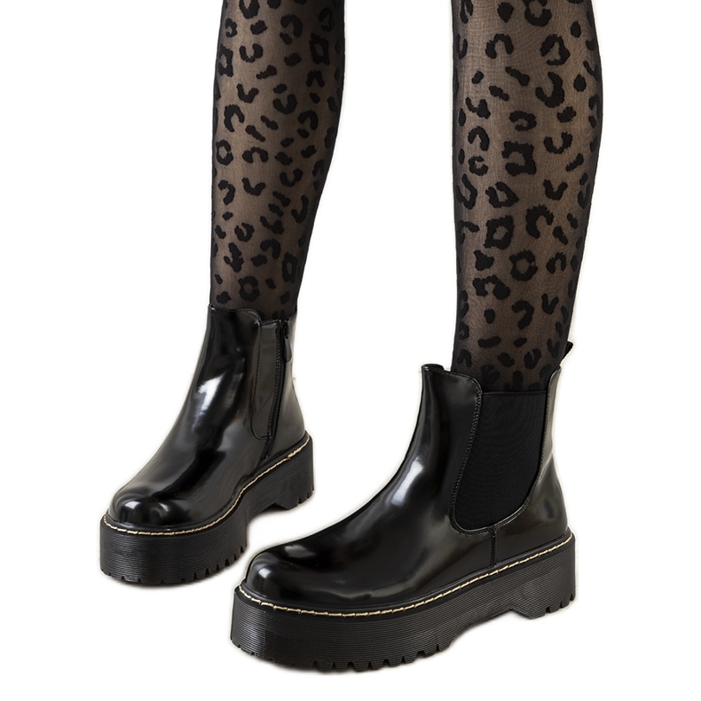 Svarta stövlar på hög Esilal-plattform