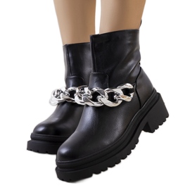 Svarta stövlar på hög Alide-sula