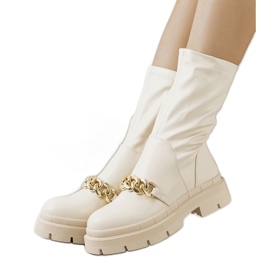 Luisina beige stövlar på hög sula