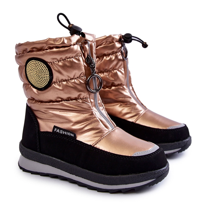 Höga snöstövlar isolerade med guldull svart