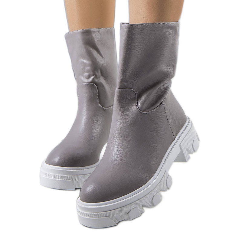 Nasidi grå isolerade stövlar