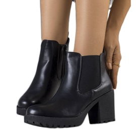 Svarta Cattan isolerade stövlar