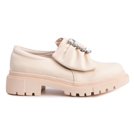 Beiga dambrogues med rosett från Shelovet beige