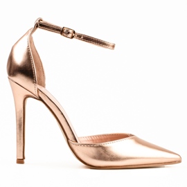 Kvinnors Shelovet gyllene klackar fäst runt ankeln