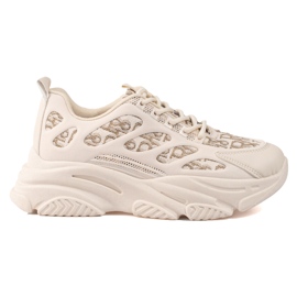 Shelovet kvinnors sneakers på en tjock sula beige